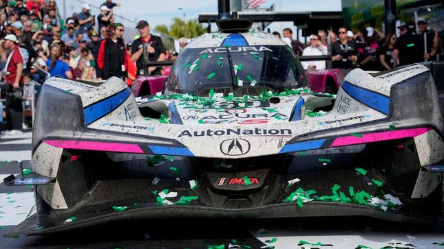 The No. 60 Meyer Shank Racing Acura ARX-06 in the winner’s circle after taking overall victory at the 2023 Rolex 24 at Daytona.