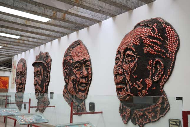 Portraits of Chairman Mao made by hundreds of badges from the Cultural Revolution.