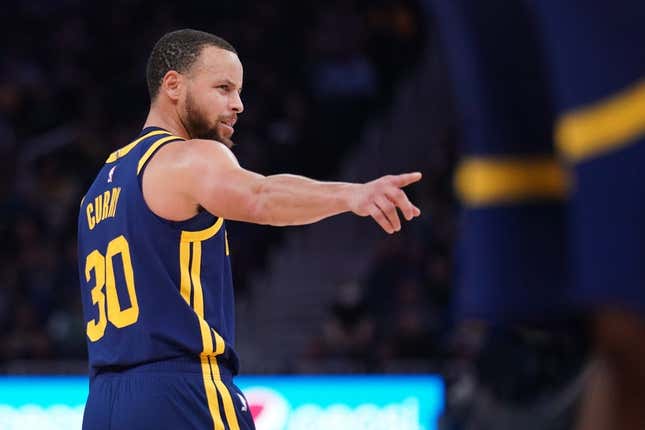 Feb 4, 2023; San Francisco, California, USA; Golden State Warriors guard Stephen Curry (30) directs teammates before a play against the Dallas Mavericks in the third quarter at the Chase Center.