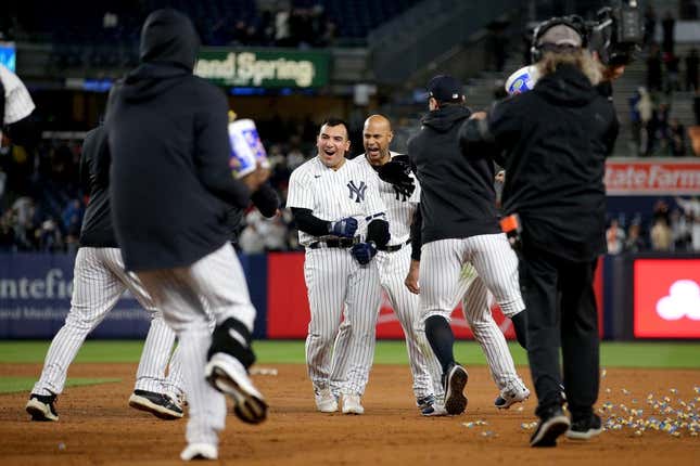 May 3, 2023; Bronx, New York, USA; New York Yankees pinch hitter Jose Trevino (39) celebrates his tenth inning walkoff RBI single against the Cleveland Guardians with teammates at Yankee Stadium.
