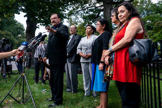Domingo Garcia, the national president of the League of United Latin American Citizens, speaks to the media about migrants who were transported by bus from the U.S.-Mexico border and dropped off near Vice President Kamala Harris’ home in residential Washington, Thursday, Sept. 15, 2022. 