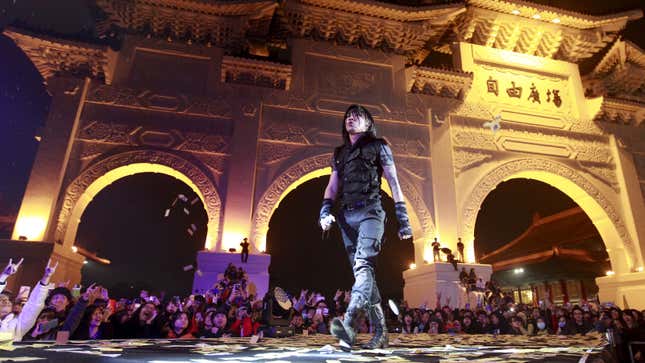 Freddy Lim, a candidate to the 2016 legislative election and singer of death metal band Chthonic, performs during a concert to boost his campaign in Taipei, Taiwan, December 26, 2015.