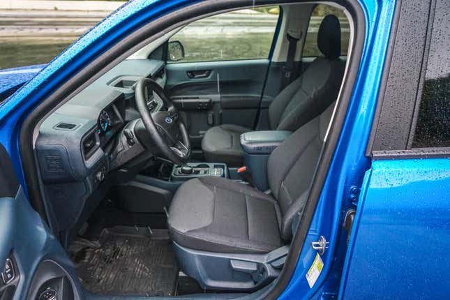 View from the open driver's door on the Ford Maverick XL 2023 truck.