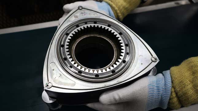 Image of a person holding a rotor from the MX-30 e-Skyactiv R-EV.