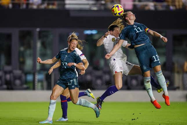 Germany forward Alexandra Popp (11) clears a cross intended for United States midfielder Andi Sullivan (17) during the first half at DRV PNK Stadium.