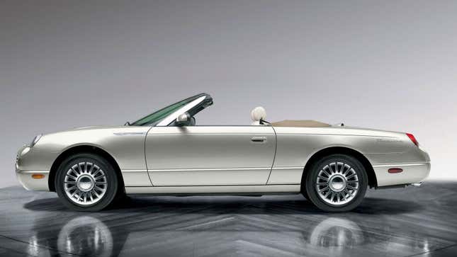 A photo of a silver Ford Thunderbird convertible from 2004. 