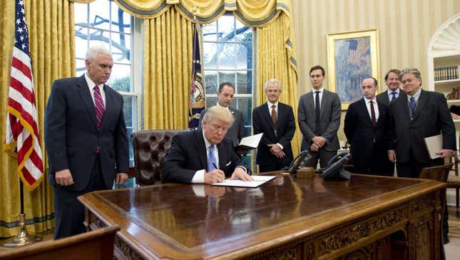 Signing the executive orders.