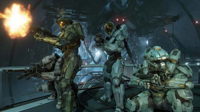 Master Chief and his Blue Team squad of Spartans fighting off-screen enemies. 