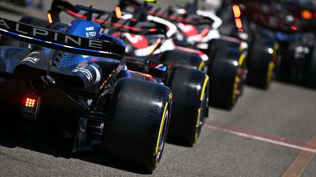 A photo of Formula 1 cars lined up at the start of the race. 