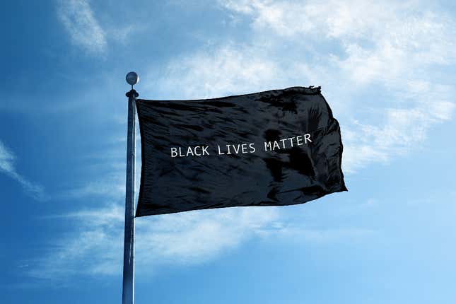 Image for article titled 2 Oregon Police Officers Charged in Incident Involving Home With Black Lives Matter Flag Being Vandalized