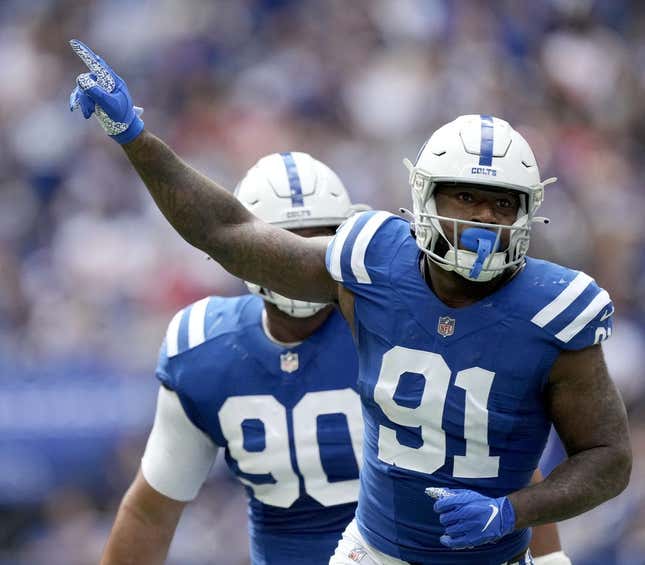 Sep 25, 2022; Indianapolis, Indiana, USA; Indianapolis Colts defensive end Yannick Ngakoue (91) celebrates after sacking Kansas City Chiefs quarterback Patrick Mahomes (not pictured) during a game at Lucas Oil Stadium.