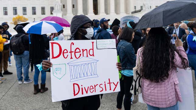 Protesters gather in front of the U.S. Supreme Court as affirmative action cases involving Harvard and University of North Carolina admissions are heard by the court in Washington on Monday, October 31, 2022. 
