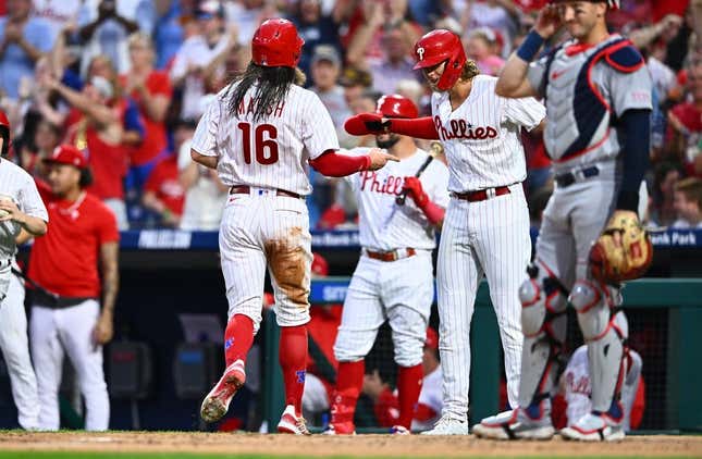 Aug 25, 2023; Philadelphia, Pennsylvania, USA; Philadelphia Phillies outfielder Brandon Marsh (16) celebrates with infielder Alec Bohm (28) after scoring against the St. Louis Cardinals in the second inning at Citizens Bank Park.