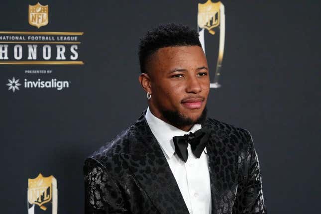 Feb 9, 2023; Phoenix, Arizona, US; Saquon Barkley poses for a photo on the red carpet before the NFL Honors award show at Symphony Hall.