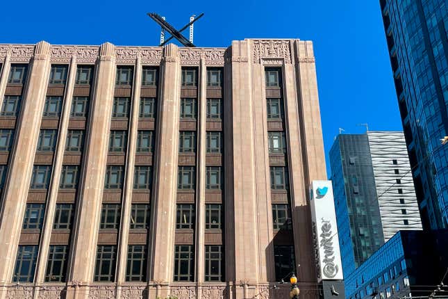 FILE - A large, metal &quot;X&quot; sign is seen on top of the downtown building that housed what was once Twitter, now rebranded by its owner, Elon Musk, in San Francisco, Friday, July 28, 2023. Musk said Thursday, Aug. 31, that his social network X, formerly known as Twitter, will give users the ability to make voice and video calls on the platform. (AP Photo/Haven Daley, File)