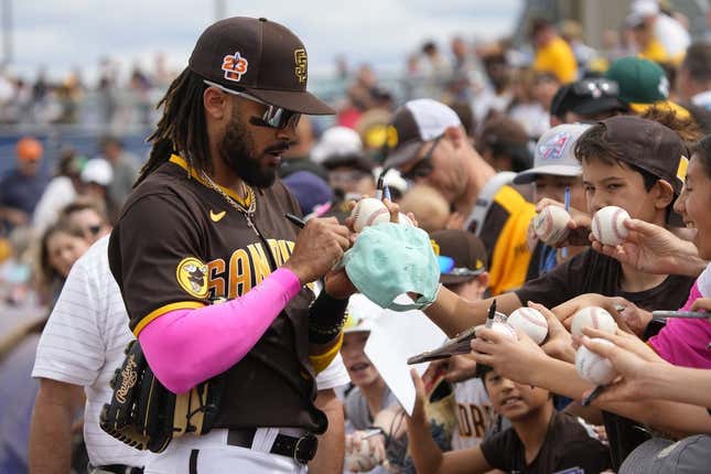 Mar 11, 2023; Peoria, Arizona, USA; San Diego Padres right fielder Fernando Tatis Jr. (23) signs autographs before a game against the Chicago White Sox at Peoria Sports Complex.