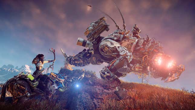 Aloy sits astride a machine while aiming a bow and arrow at a much larger beast-like machine in a screenshot from Horizon Zero Dawn.