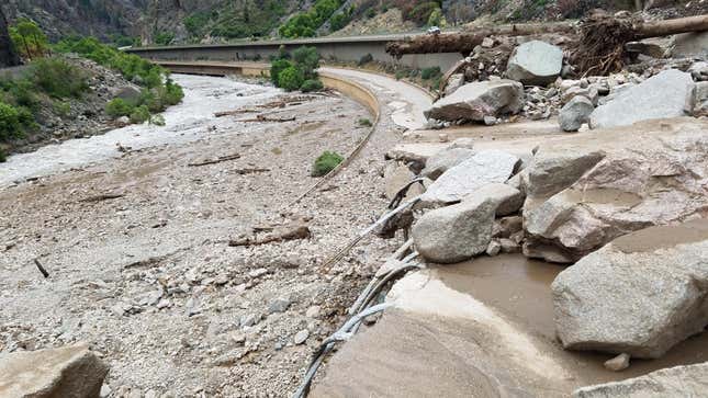 A stretch of I-70 in Colorado clogged by debris after heavy rain and landslides.
