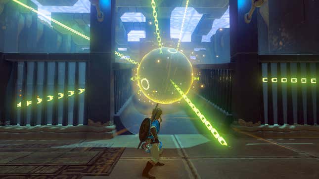 A The Legend of Zelda: Breath of the Wild image of Link using the stasis rune ability to freeze a rolling boulder in place.