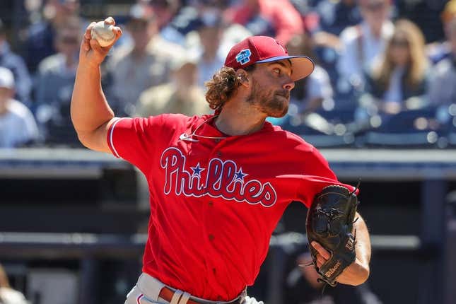 Mar 15, 2023; Tampa, Florida, USA; Philadelphia Phillies starting pitcher Aaron Nola (27) throws a pitch during the first inning against the New York Yankees at George M. Steinbrenner Field.