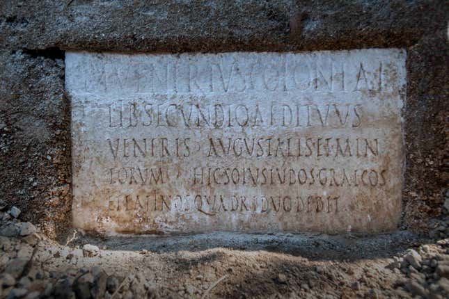 The inscription, written on a marble slab, found at the tomb.