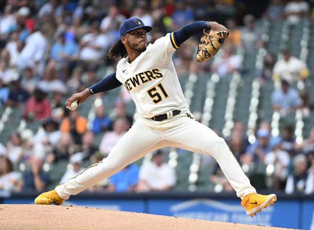 Aug 7, 2023; Milwaukee, Wisconsin, USA; Milwaukee Brewers starting pitcher Freddy Peralta (51) delivers a pitch against the Colorado Rockies in the first inning at American Family Field.