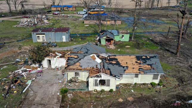 In an aerial view, residents continue their recovery efforts in the aftermath of a tornado on March 28, 2023 in Silver City, Mississippi.