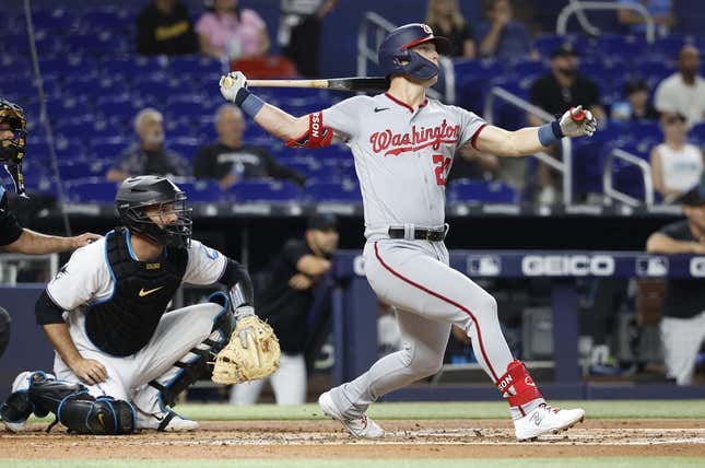 May 17, 2023; Miami, Florida, USA; Washington Nationals left fielder Corey Dickerson (23) hits a home run against the Miami Marlins during the second inning at loanDepot Park.