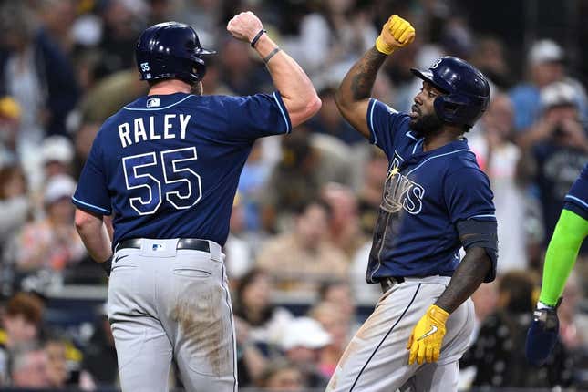 Jun 16, 2023; San Diego, California, USA; Tampa Bay Rays left fielder Randy Arozarena (right) is congratulated by right fielder Luke Raley (55) after hitting a three-run home run against the San Diego Padres during the fifth inning at Petco Park.