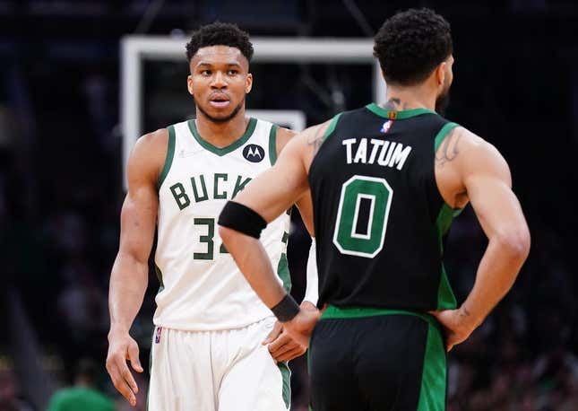 May 1, 2022; Boston, Massachusetts, USA; Milwaukee Bucks forward Giannis Antetokounmpo (34) and Boston Celtics forward Jayson Tatum (0) on the court in the second half during game one of the second round for the 2022 NBA playoffs at TD Garden.