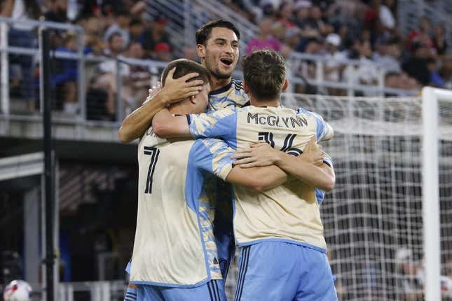 Aug 26, 2023; Washington, District of Columbia, USA; Philadelphia Union forward Mikael Uhre (7) celebrates with teammates after scoring a goal past D.C. United goalkeeper Tyler Miller (not pictured) during the first half at Audi Field.