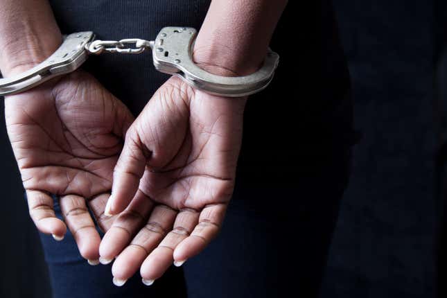 Handcuffed Black woman 