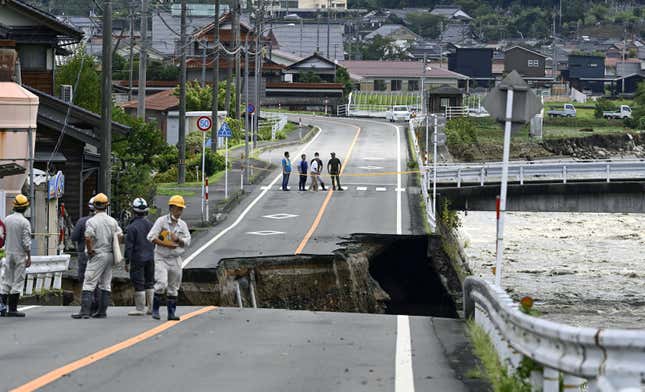 A collapsed road near the Saji River is pictured in Tottori, western Japan, after Typhoon Lan hit the region in this photo taken by Kyodo on August 16, 2023. 