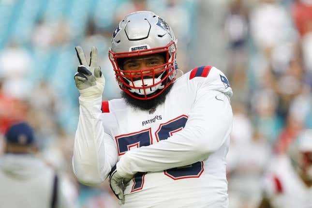 Jan 9, 2022; Miami Gardens, Florida, USA; New England Patriots offensive tackle Isaiah Wynn (76) reacts from the field prior to the game against the Miami Dolphins at Hard Rock Stadium.