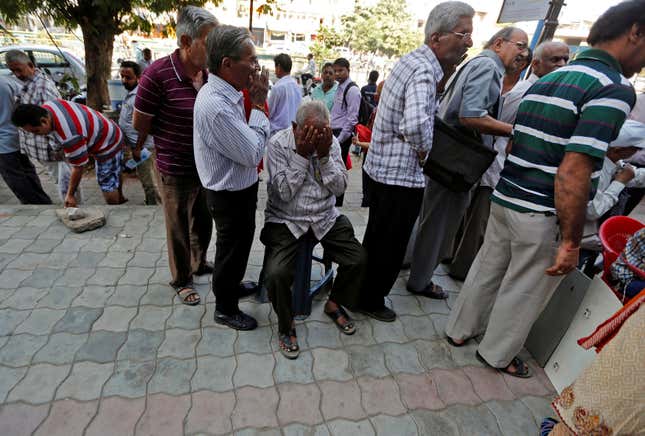 A queue to deposit or exchange old banknotes.