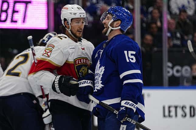 May 4, 2023; Toronto, Ontario, CANADA; Florida Panthers defenseman Brandon Montour (62) and Toronto Maple Leafs forward Alexander Kerfoot (15) talk during a break in the action during the third period of game two of the second round of the 2023 Stanley Cup Playoffs at Scotiabank Arena.
