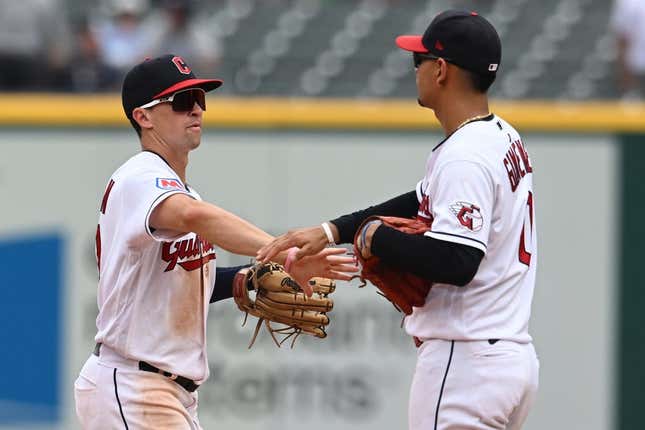 Jul 26, 2023; Cleveland, Ohio, USA; Cleveland Guardians right fielder Will Brennan (17) and second baseman Andres Gimenez (0) celebrate after the Guardians beat the Kansas City Royals at Progressive Field.