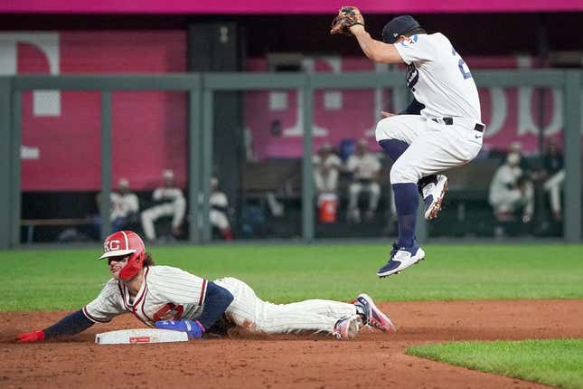 Sep 16, 2023; Kansas City, Missouri, USA; Houston Astros second baseman Jose Altuve (27) can   t make the tag as Kansas City Royals shortstop Bobby Witt Jr. (7) steals second base in the third inning at Kauffman Stadium.