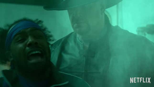 The Undertaker looms over a terrified Xavier Woods in Escape the Undertaker.
