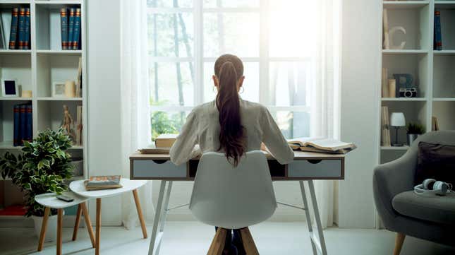 woman working quietly at a desk