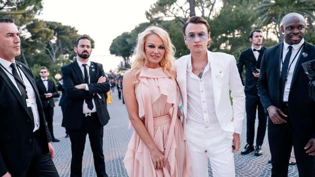 Pamela Anderson and her son Brandon Lee attend the amfAR Cannes Gala on May 23, 2019 in Cap d’Antibes, France.