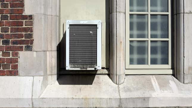 in-wall air conditioning unit on outside of a home