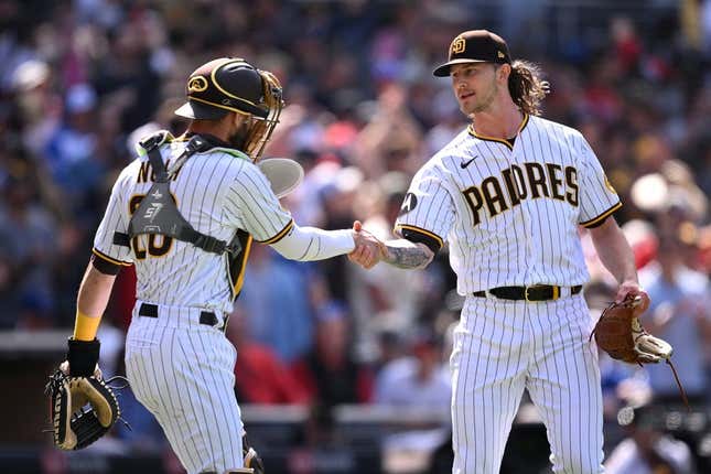 Apr 19, 2023; San Diego, California, USA; San Diego Padres catcher Austin Nola (26) and relief pitcher Josh Hader (71) shake hands after defeating the Atlanta Braves at Petco Park.