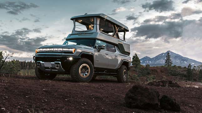An image showing the GMC Hummer EV converted to a camper. 