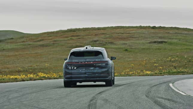 The rear view of a camouflaged Lucid Gravity SUV