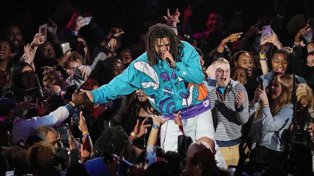 J. Cole interacts with fans during the 2019 All-Star Game in Charlotte.