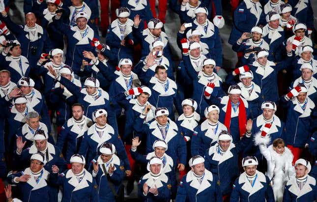 Russia’s athletes cheer during the athletes’ parade at the opening ceremony of the 2014 Sochi Winter Olympics, Feb. 7, 2014.