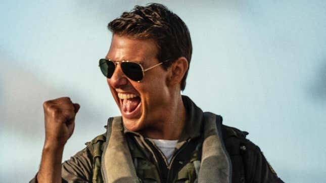 Tom Cruise in his Top Gun costume, pumping his fist.