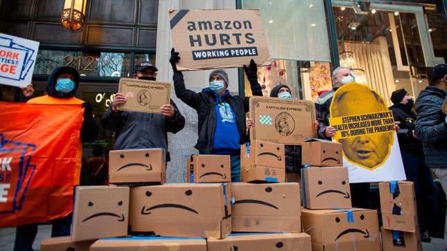 Amazon workers and community allies demonstrate during a protest organized by New York Communities for Change and Make the Road New York in front of Jeff Bezos’ Manhattan residence in New York on December 2, 2020