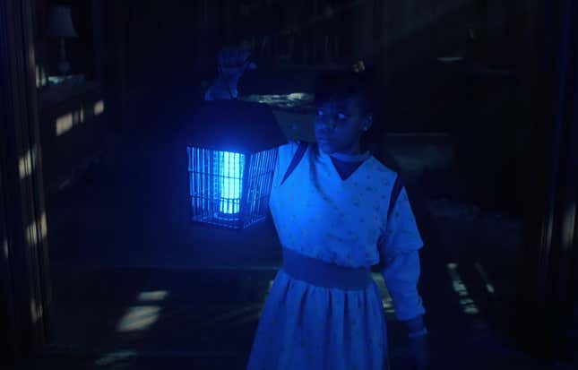 Erica holds a blue light